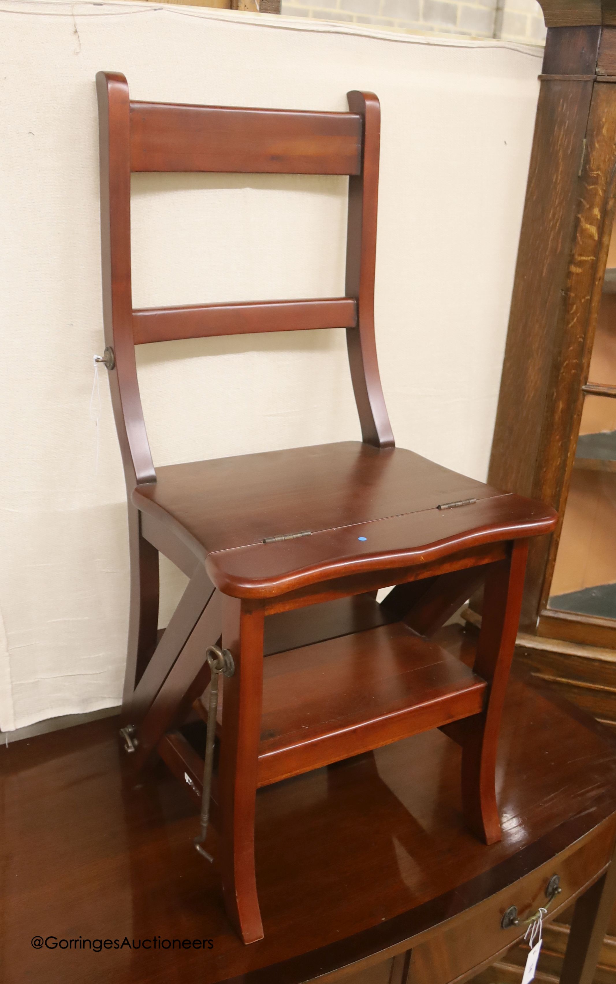 A Victorian style mahogany metamorphic library chair